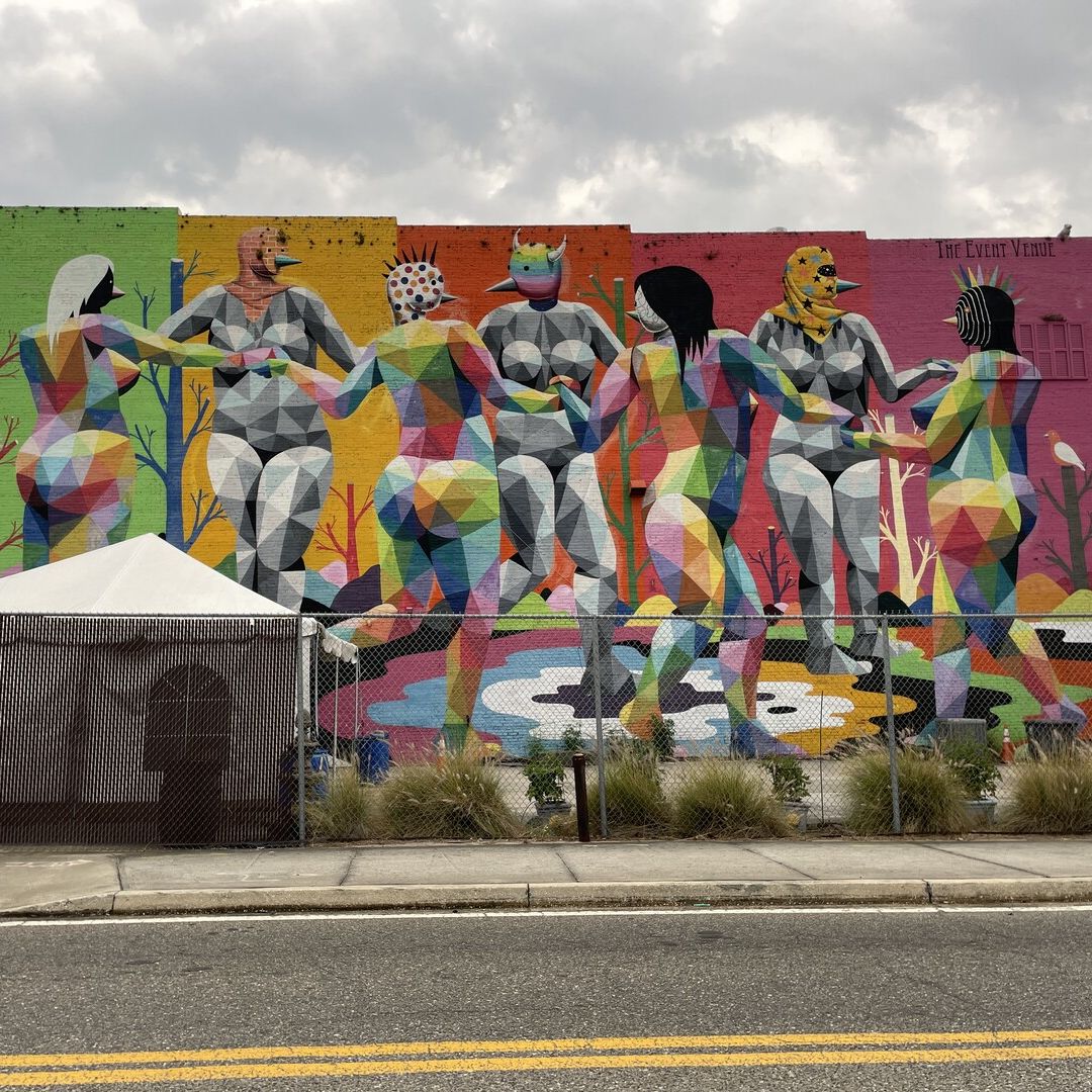 The Dance of the Seven Sins Muses. Mural on the building 927 W Forsyth St, Jacksonville, Florida, USA