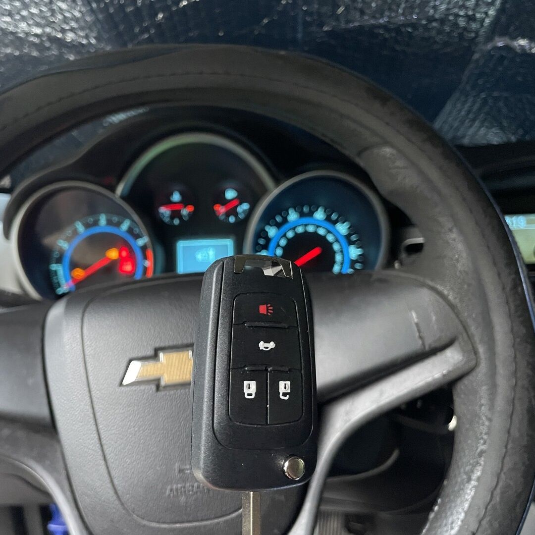 New keyfob (flip key) for the Chevrolet Cruze 2012 with manual transmission stick. Hillard, Fl poster image